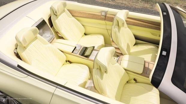 $!Birds eye view of Cadillac SOLLEI concept vehicle with bespoke Sola Yellow Iridescent interior