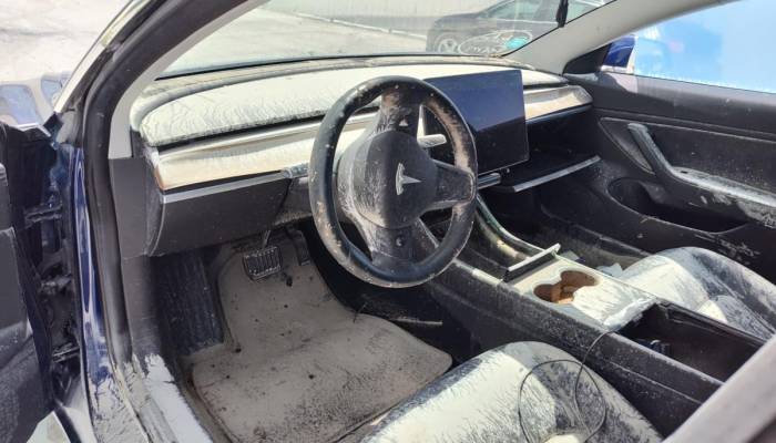 Interior embarrado de un coche tras una inundación por una DANA